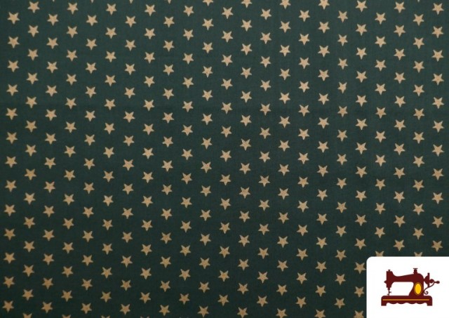 Acheter en ligne Tissu en Coton Imprimé avec Étoiles Brillantes de Noël couleur Vert Bouteille